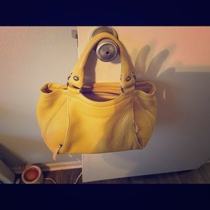 Yellow Cole Haan purse
